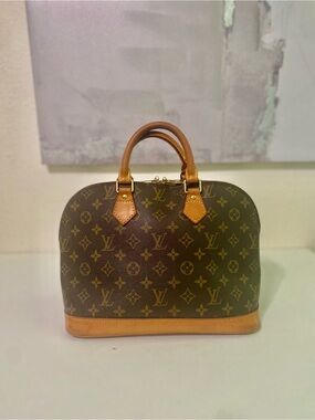 Louis Vuitton Monogram Alma Satchel in Brown and Tan